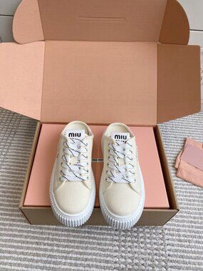 Miu Miu Cream Canvas Platform Sneakers